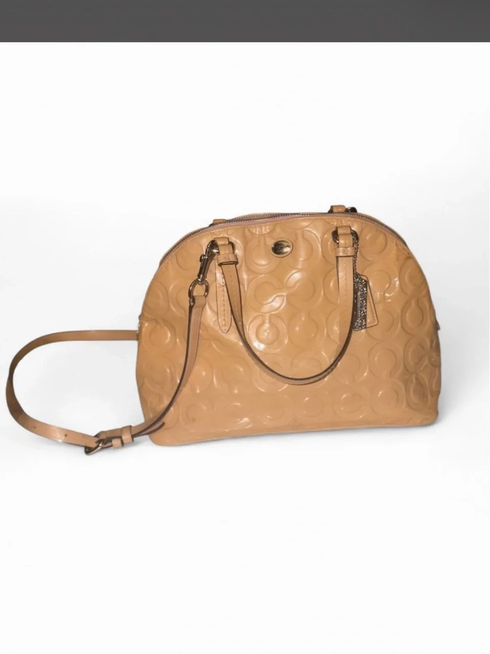 Coach - Peyton Cora in Tan Glossy PVC crossbody with a metallic finish